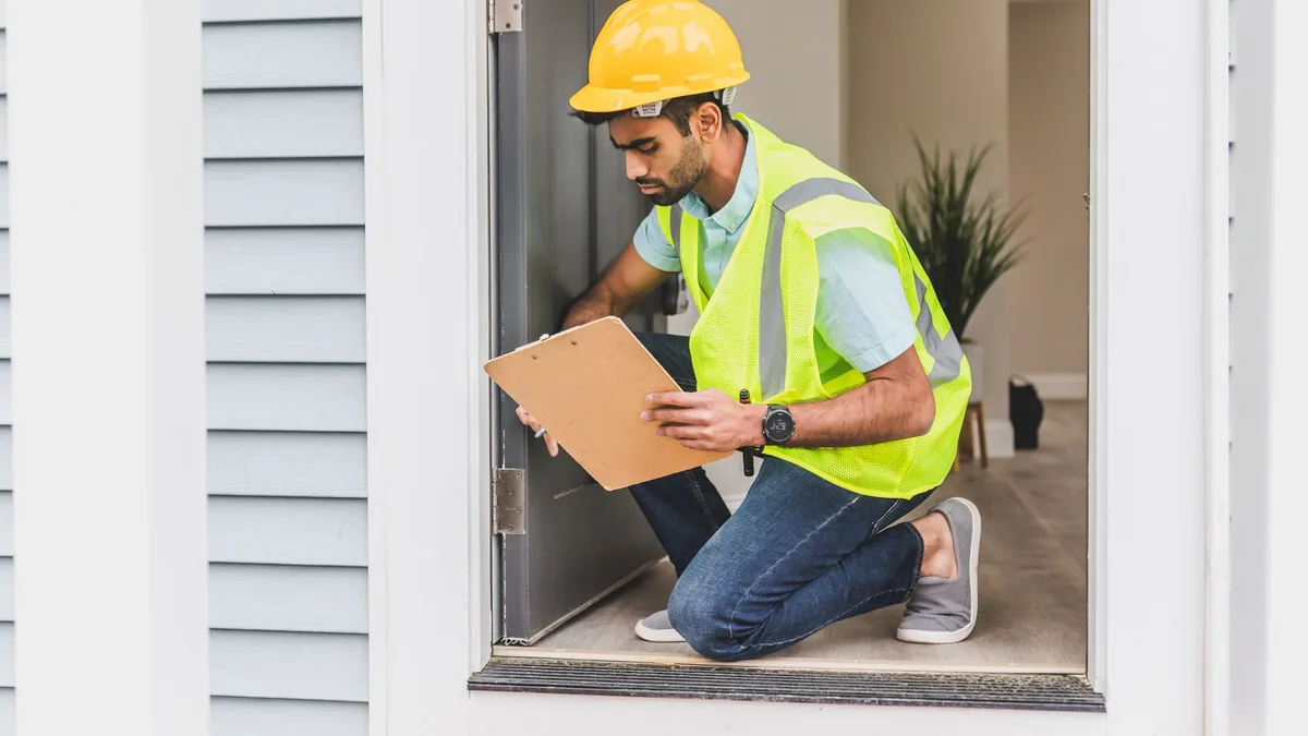 Contractor reviewing foundation findings with a Newark, NJ homeowner